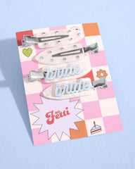 xo, Fetti four-clip set arranged to show mix of text and rhinestone styles