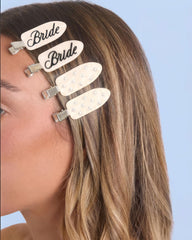 xo, Fetti clips worn while getting ready adding polished photo-ready style