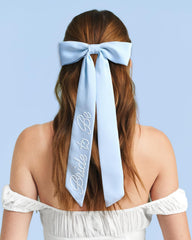 xo, Fetti satin texture detail highlighting smooth fabric and soft sheen