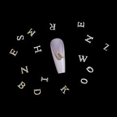 Xthrotsenk letters on a finished manicure in a salon setting, polished Y2K-inspired look