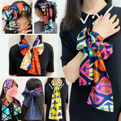 XTREND scarf beside a ruler showing 57 inch length for adaptability