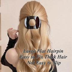 XVESOY clip worn in low bun demonstrating sleek, low-profile styling benefit