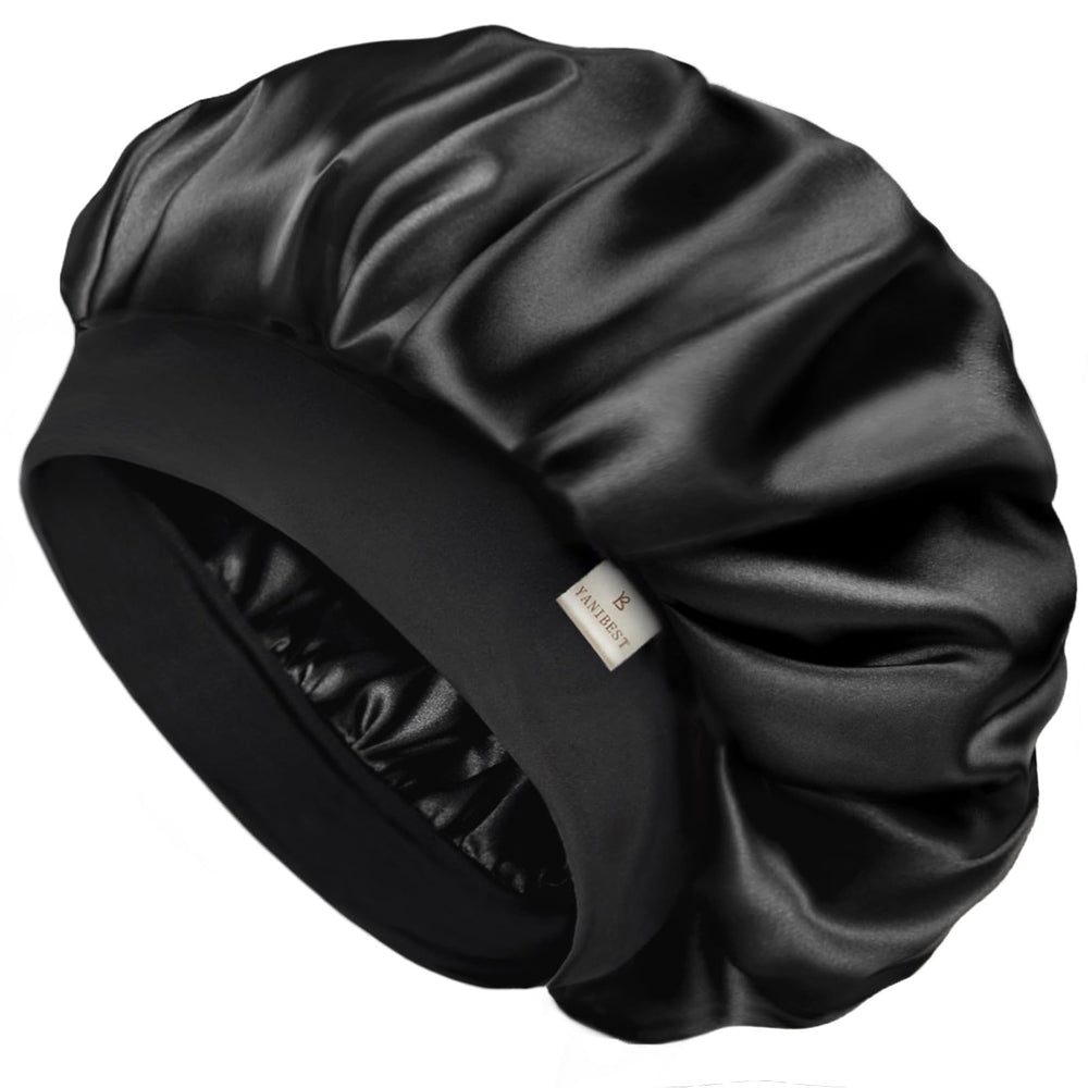 YANIBEST front view of black bonnet showing smooth satin and secure fit benefit