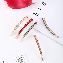 Yaomiao pin beside a ruler showing 6.5 cm length for scale and fit