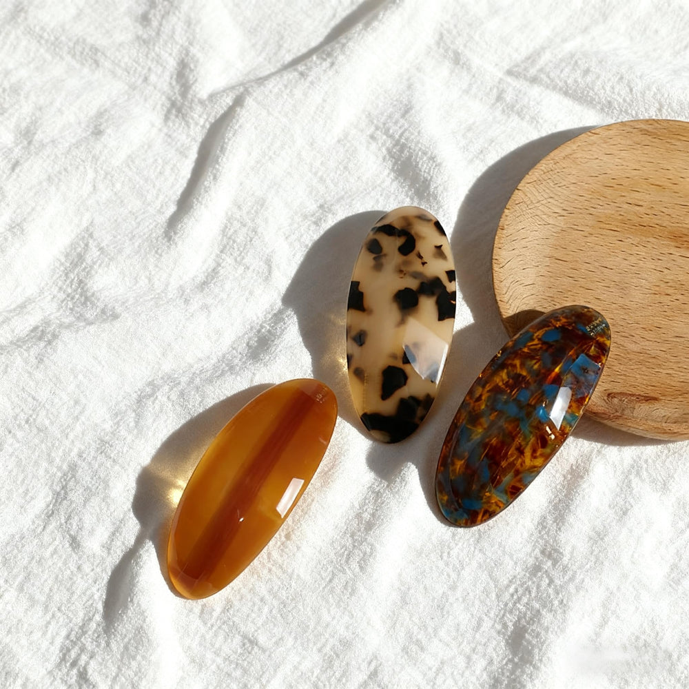 YCKXXL three-barrette set laid flat showing color variety and styling options benefit