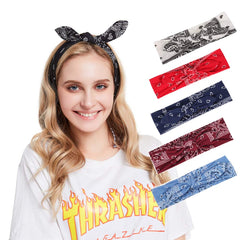 Yeshan close-up of removable wired rabbit-ear bow on headband, allowing creative styling