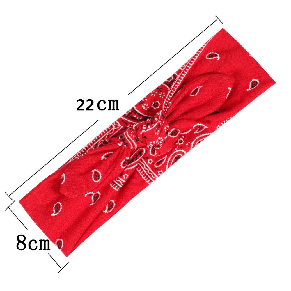 Yeshan hand holding single headband to show size and lightweight design for travel