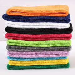 Yeshan headband stretched on hand demonstrating secure, comfortable stretch