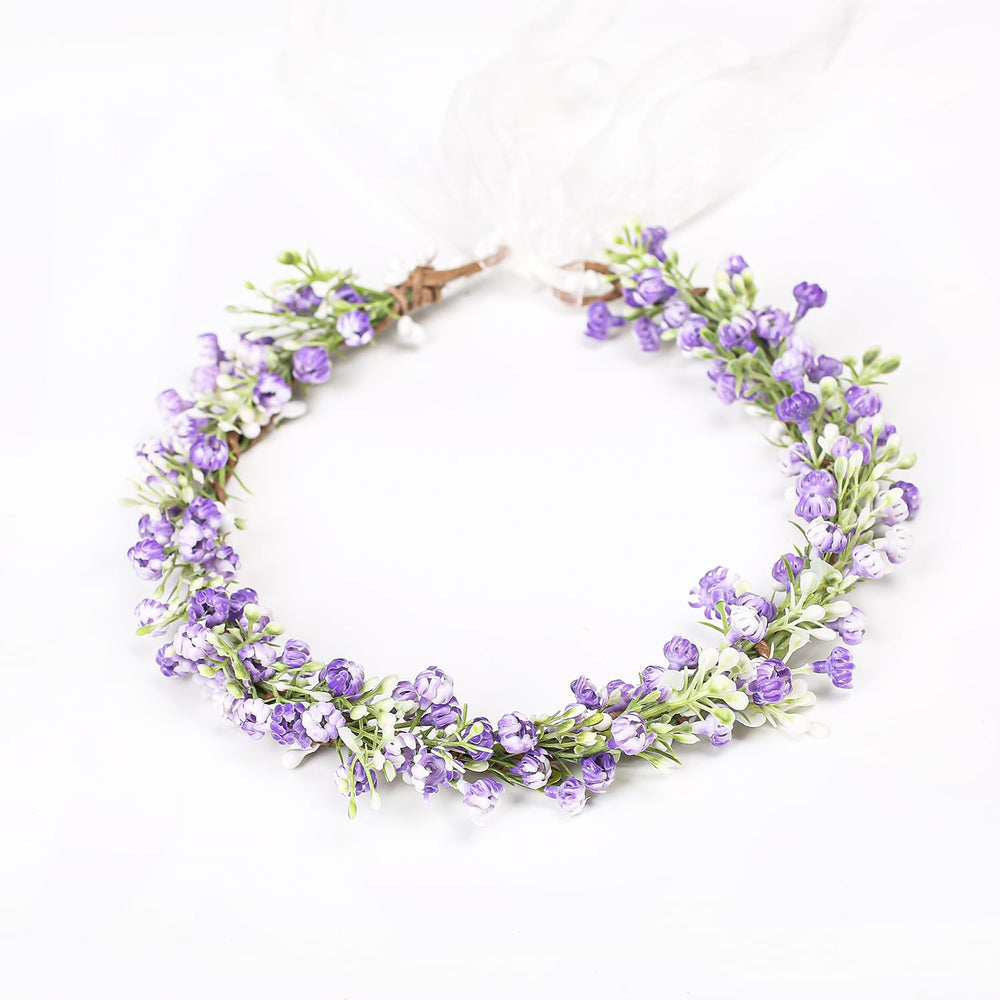 Yili Maizi flower crown on mannequin illustrating fit and maternity shoot styling