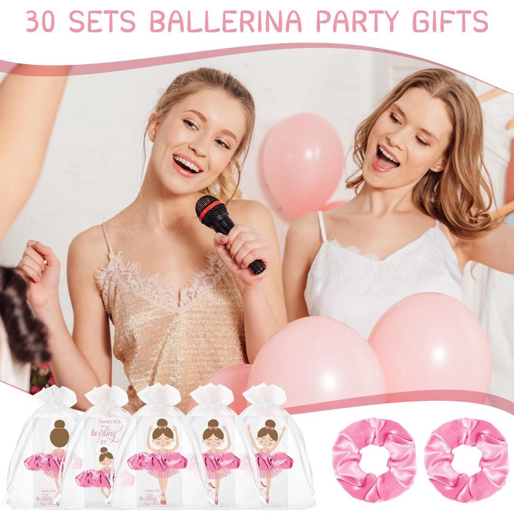 Yinkin favors arranged on a ballet-themed party table for visual impact
