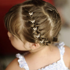 YISSION side profile on model showing low-profile butterfly clips enhancing everyday elegance