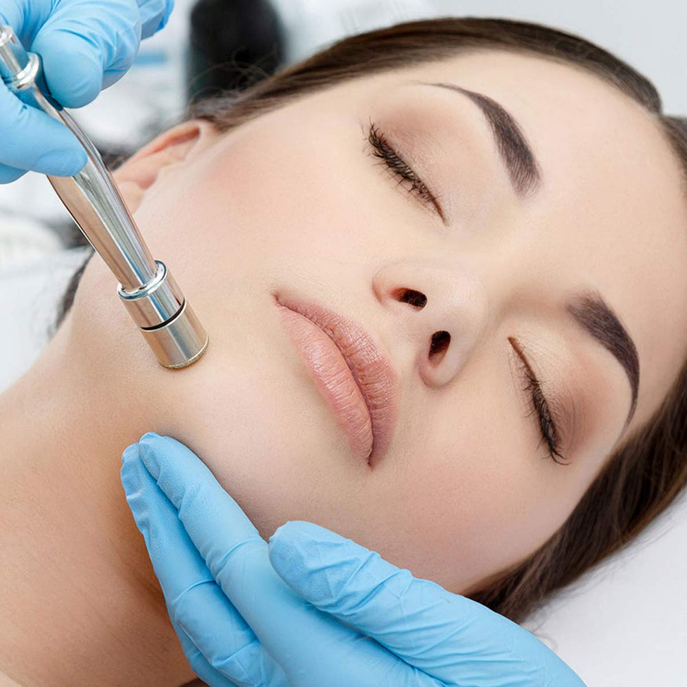 Yofuly being used on a cheek illustrating targeted exfoliation and cleansing