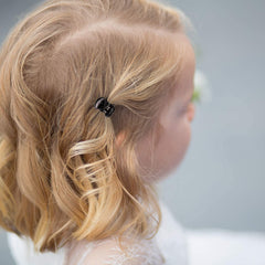 YOHAMA clip used to create a mini bun highlighting decorative styling use
