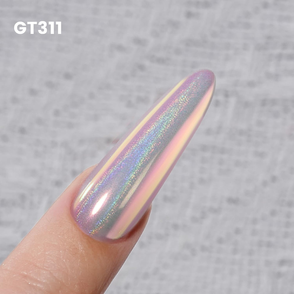YOKE FELLOW finished manicure in salon lighting showcasing holographic glow benefit