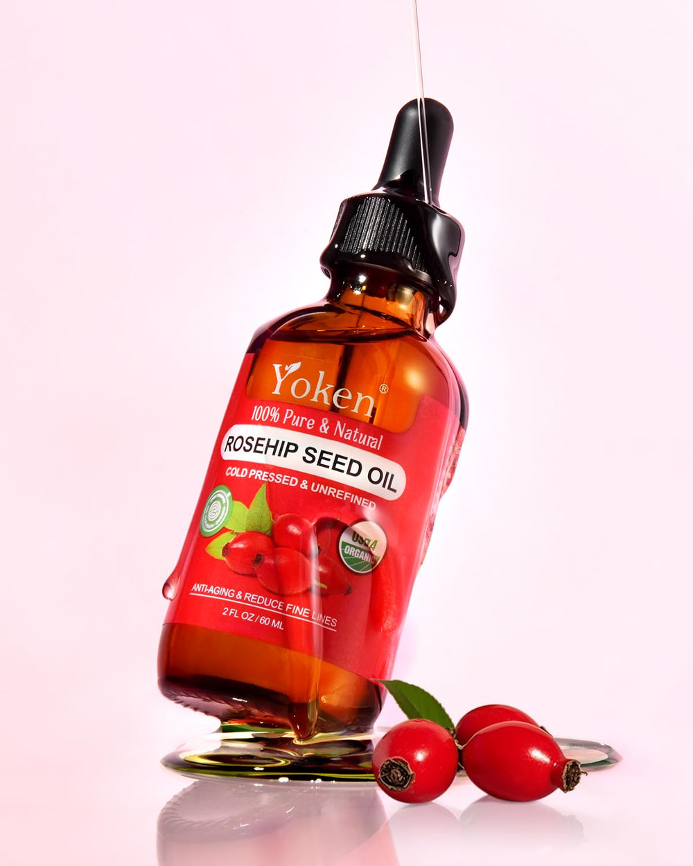 Yoken pipette dispensing clear rosehip oil drop with precise application and minimal waste