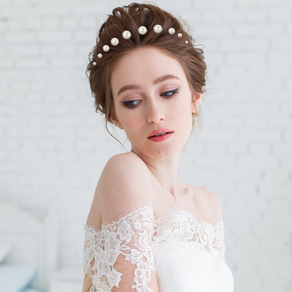 Yolev bride wearing scattered pearl pins showing finished wedding hairstyle