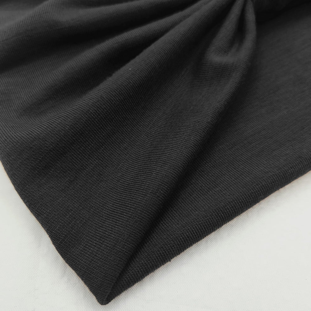 YONUF headband beside measuring tape showing width and stretch for reliable fit benefit