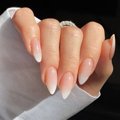 YOSOMK front view almond nails showing ombré finish and polished look