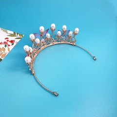 YOVECATHOU crown beside ruler showing 14 cm diameter and included packaging