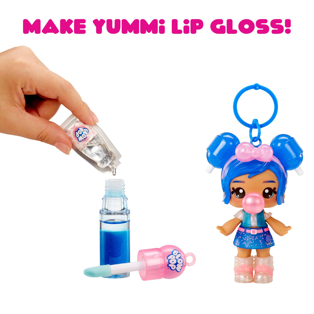 Yummiland doll held in hand, illustrating portability and play-ready scale