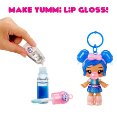 Yummiland doll held in hand, illustrating portability and play-ready scale