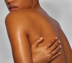 Yves Rocher oil blended on forearm showing quick absorption benefit: non-greasy finish