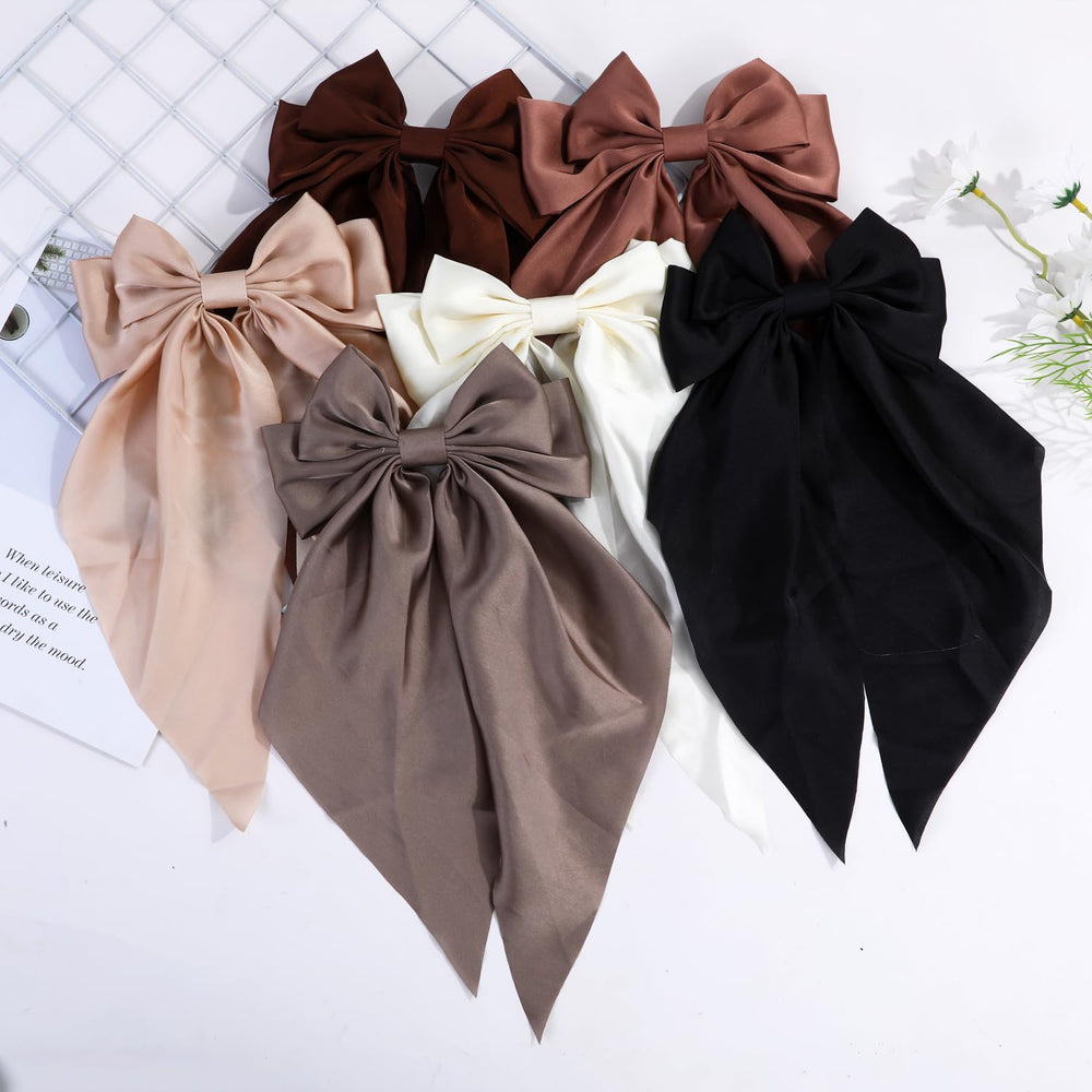 YWAOAIJD bow held in hand to show scale and easy-to-wear oversized design