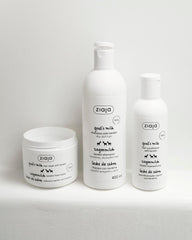Ziaja 200ml jar beside hand to show size and travel-friendly benefit