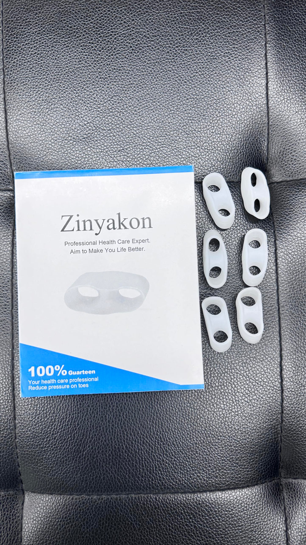 Zinyakon washable easy care rinsed under water demonstrating simple cleaning and reuse