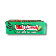 Zoeartcrafts rue soap held in hand demonstrating comfortable grip and ritual use