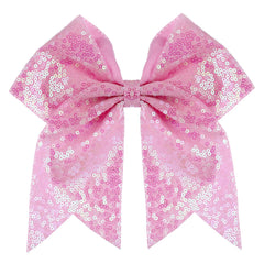 Zolyco pink front view showing large glitter bow and eye-catching sparkle