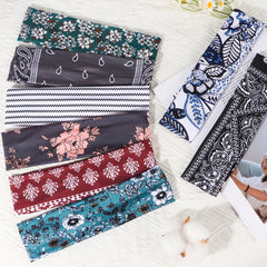 Ztomine headband next to hand showing scale and stretch for reliable fit