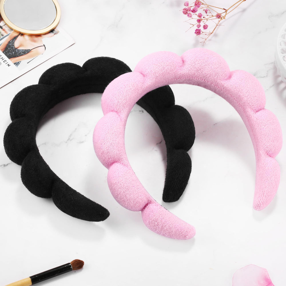 Ztomine headband on hand size comparison showing compact stretch-fit benefit