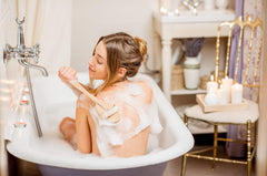 111MedCo lifestyle shot in bathroom demonstrating face and back use for body acne support