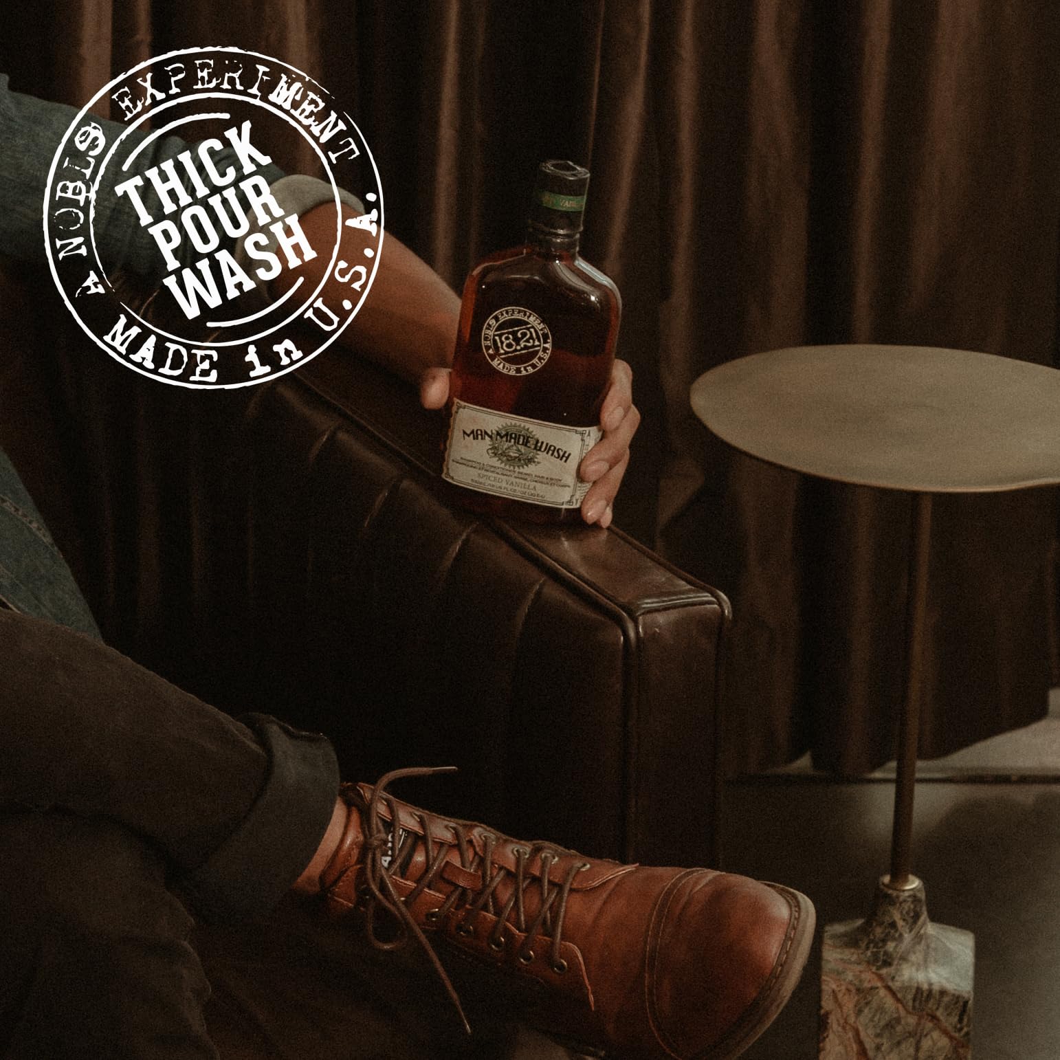 18.21 Man Made lifestyle scene near a fireside evoking the outdoorsy scent benefit