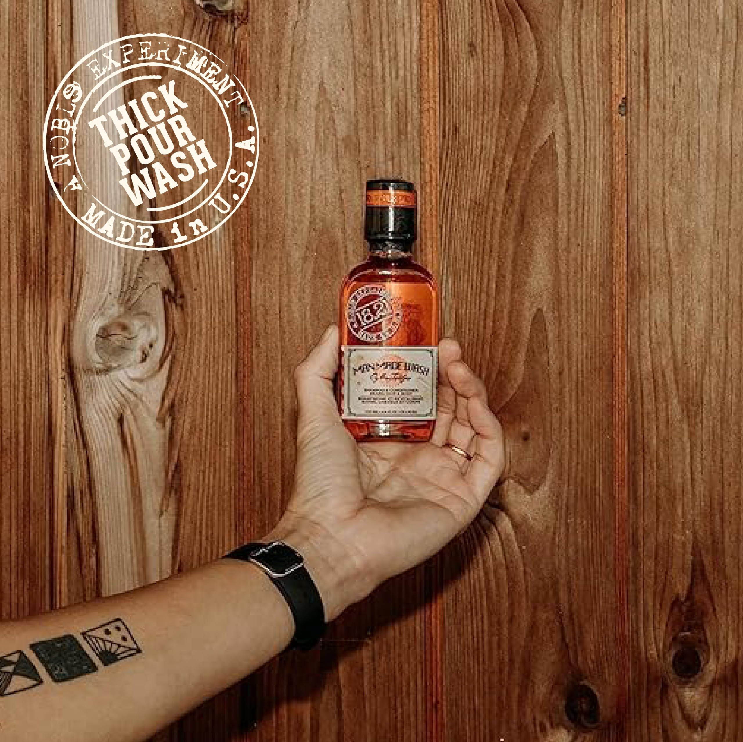 18.21 Man Made bottle on shower shelf conveying daily barbershop-style grooming