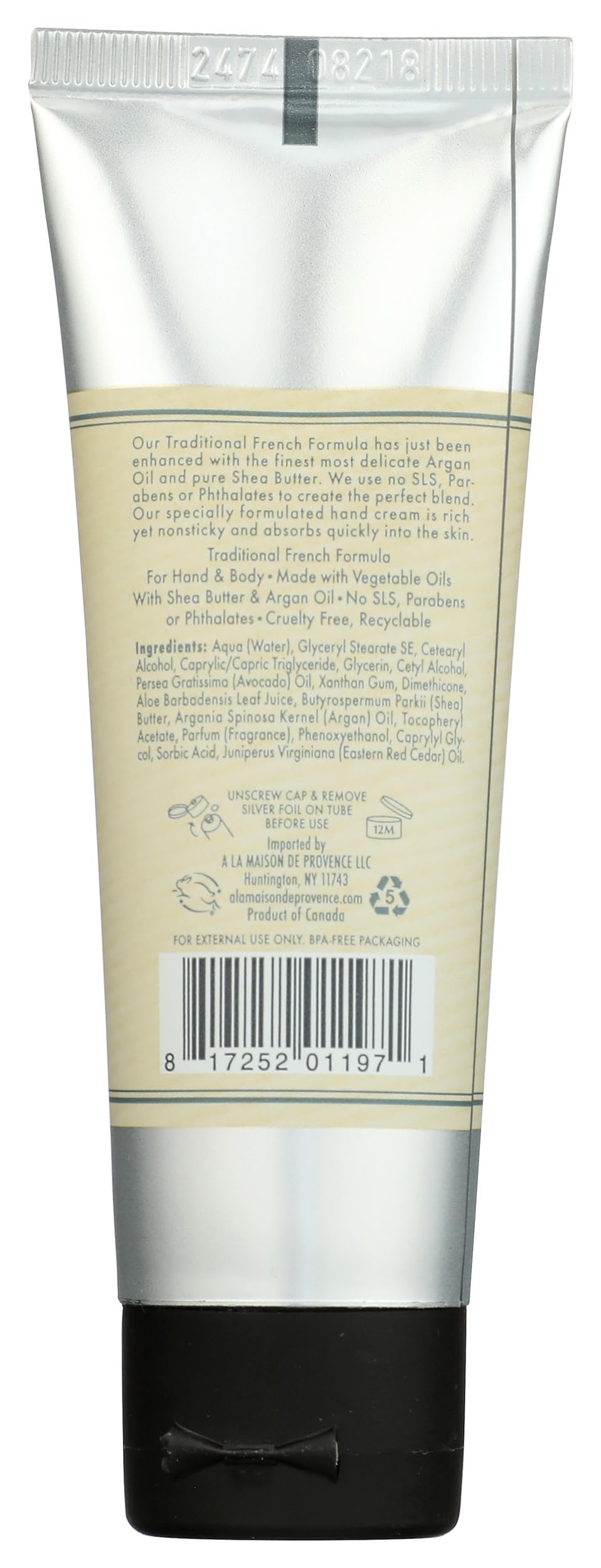 A LA MAISON cream texture at open cap highlighting quick-absorb benefit