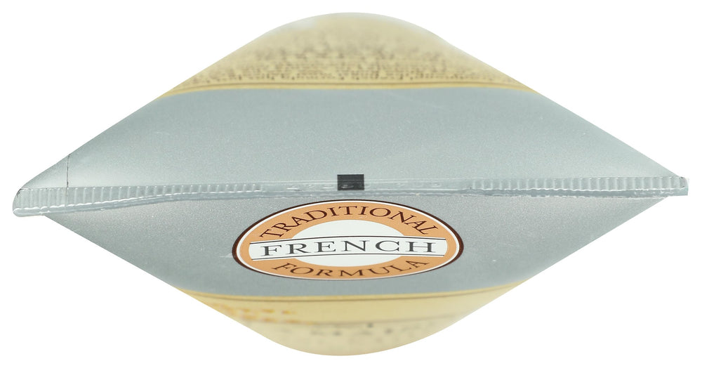 A LA MAISON bottle beside measuring tape showing compact size