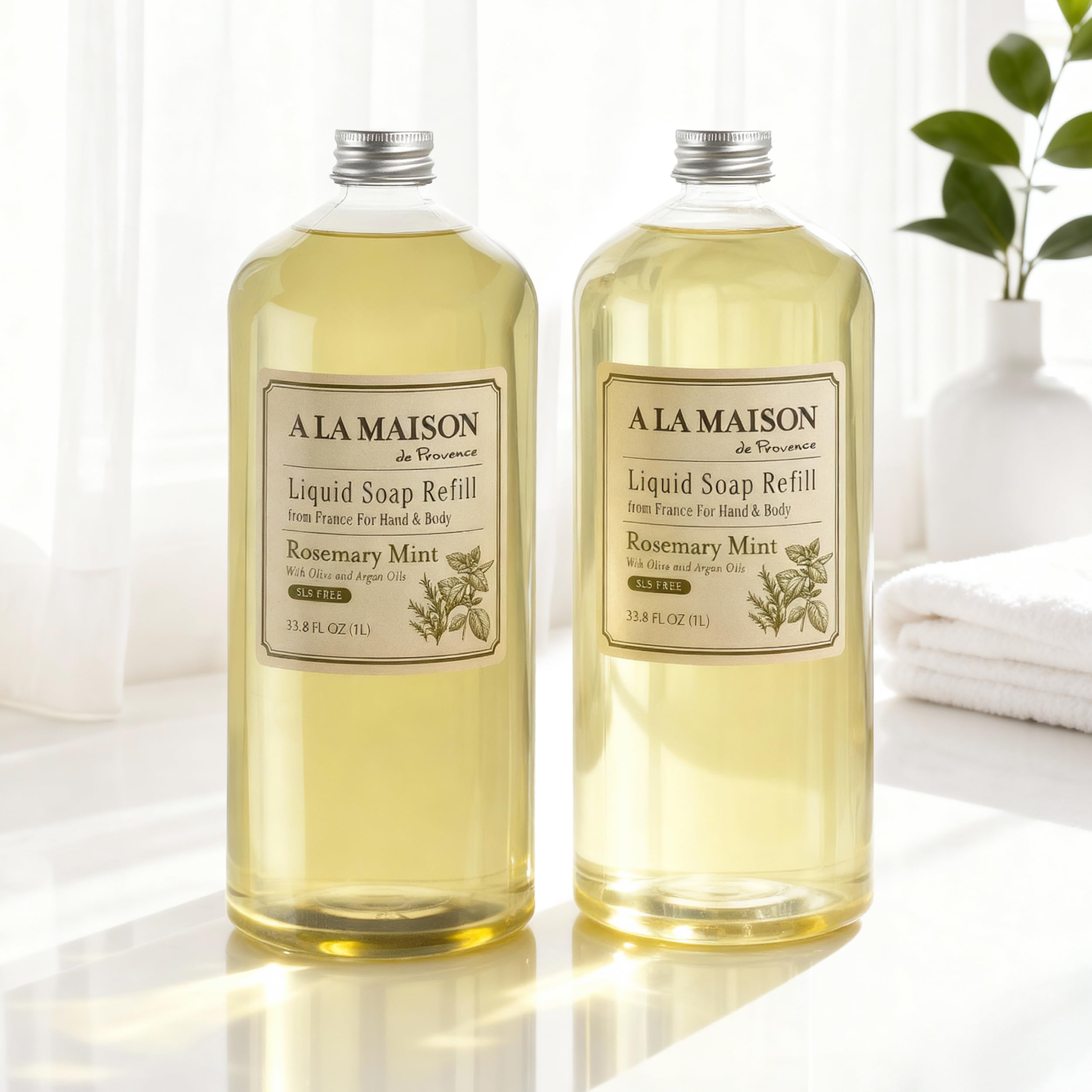 A LA MAISON refill pouring into a dispenser to show easy refill and reduced waste