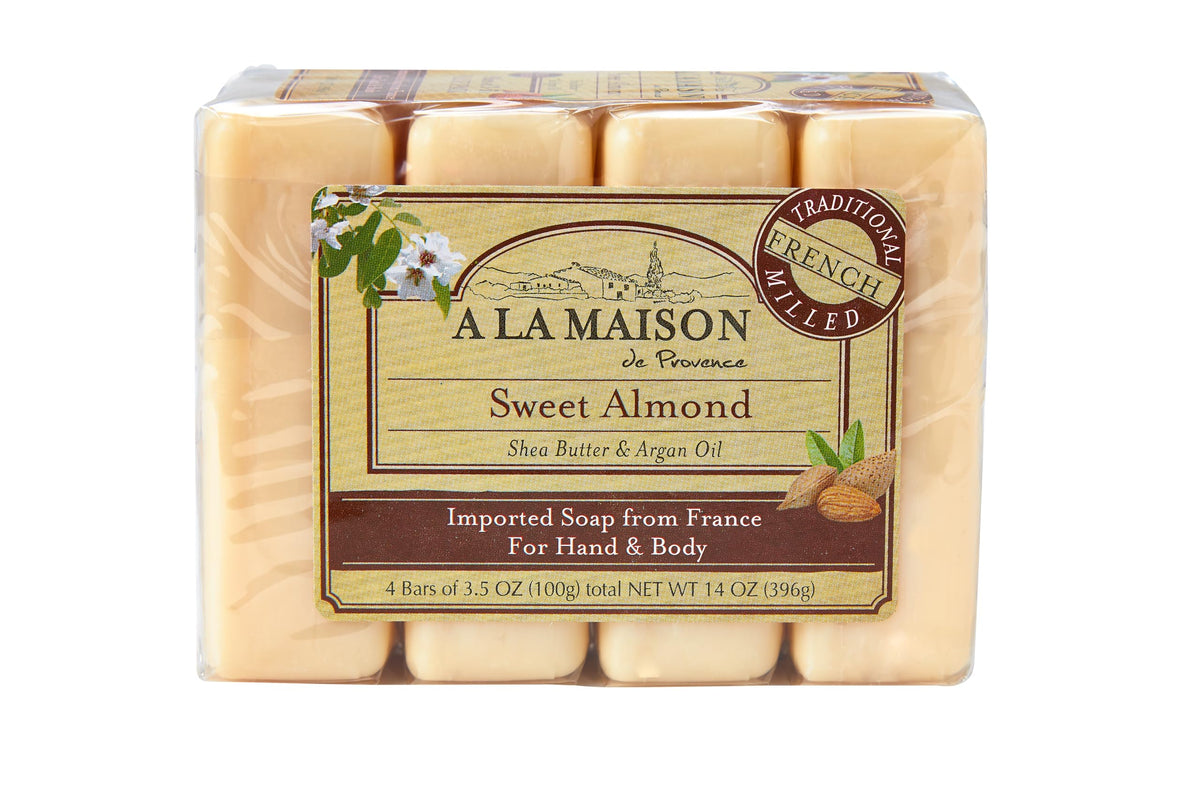 A LA MAISON front packaging showing four sweet almond soap bars and benefits