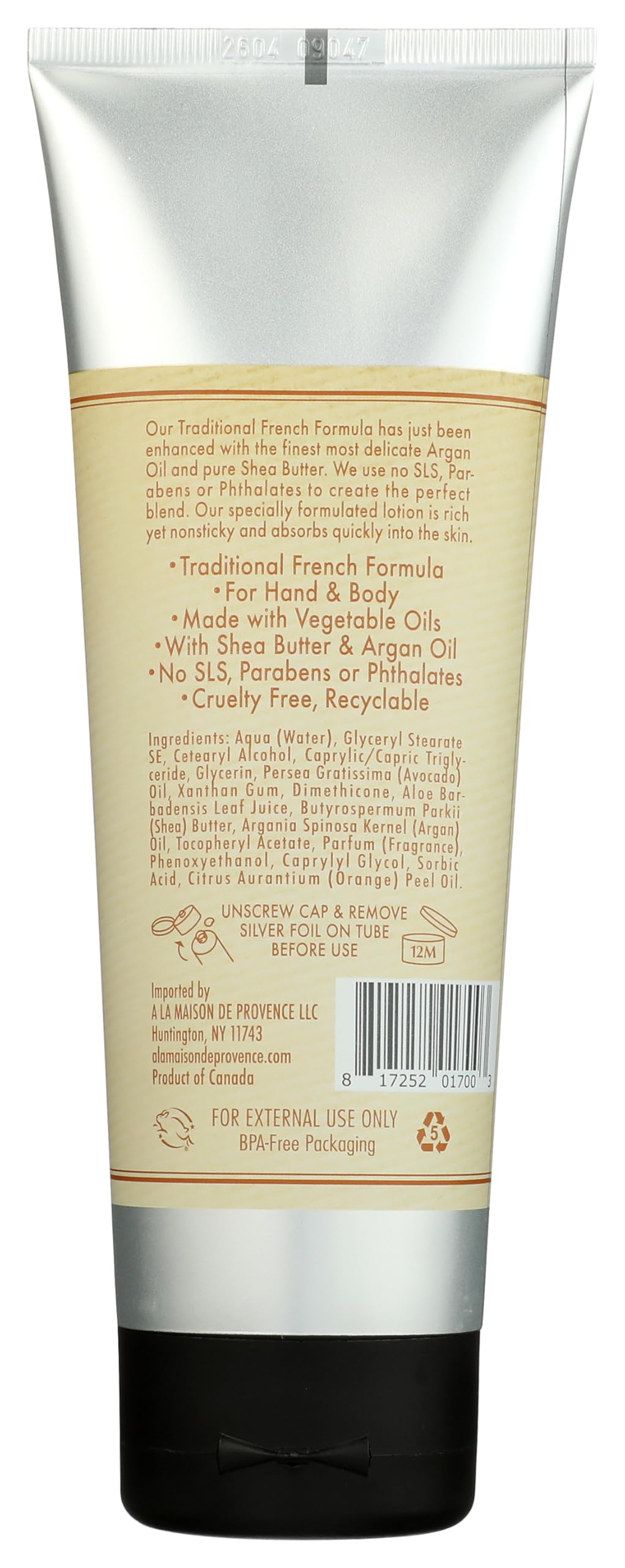 A LA MAISON creamy lotion texture close-up demonstrating smooth, non-greasy absorption