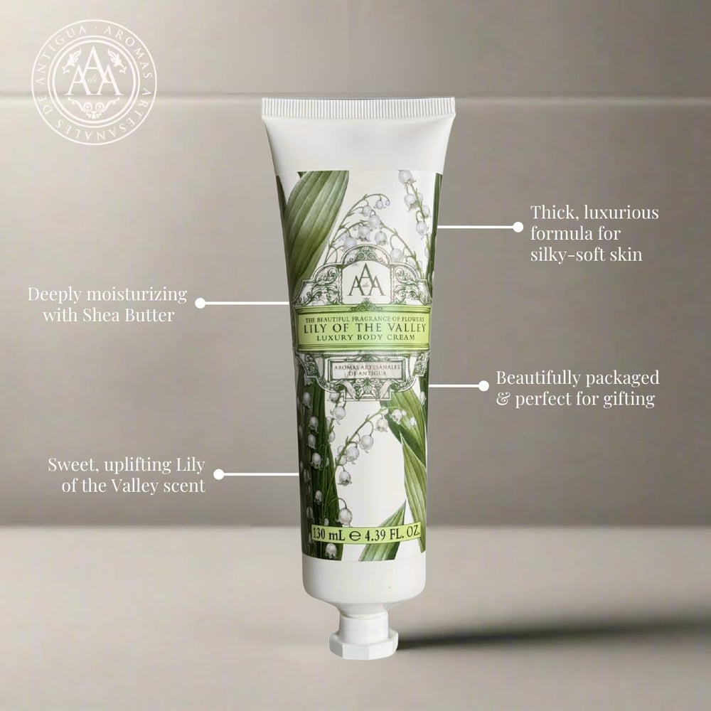 AAA DE AROMAS Artesanales de Antigua held in hand to show 2 fl oz scale and travel convenience