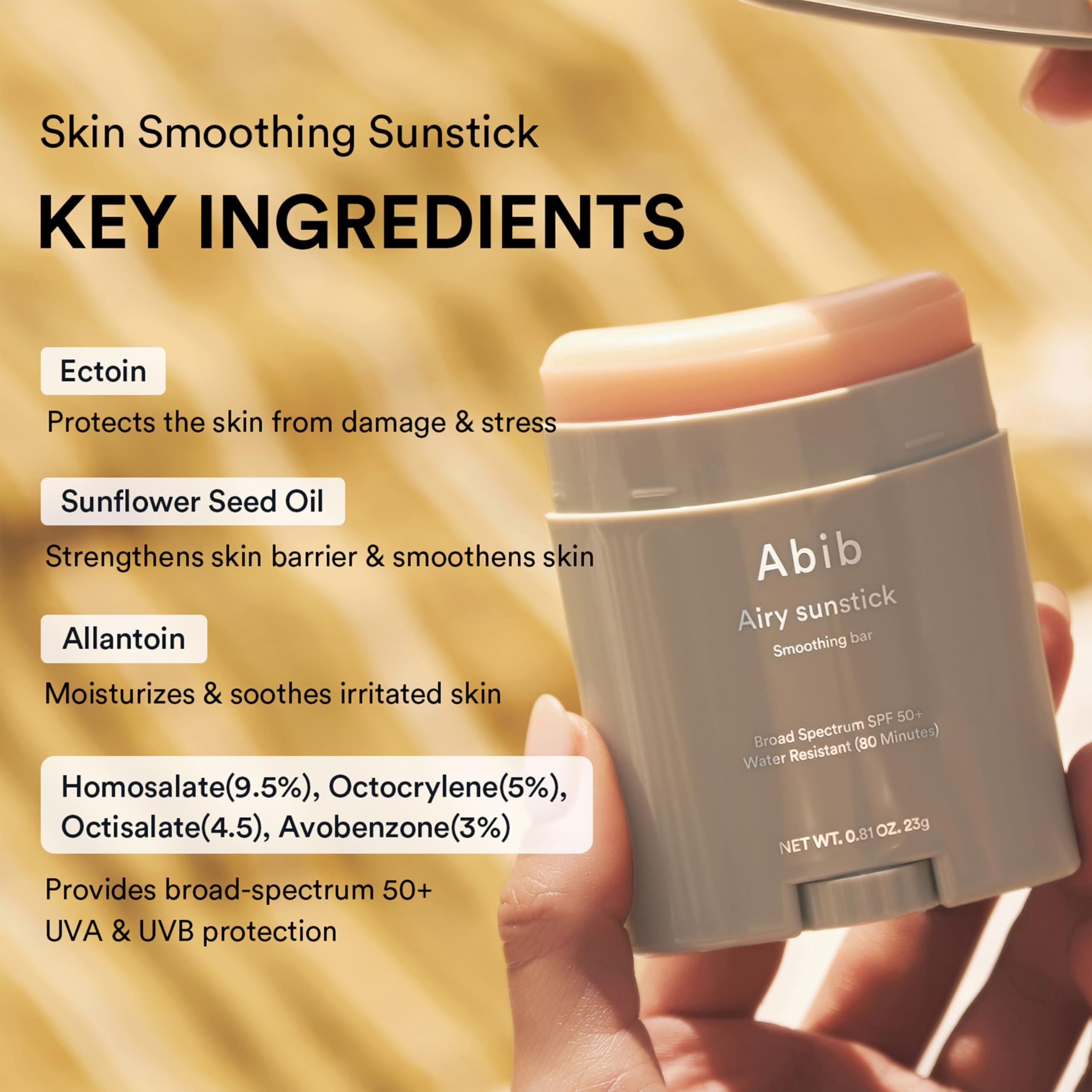 Abib hand applying sunstick for quick, mess-free reapplication