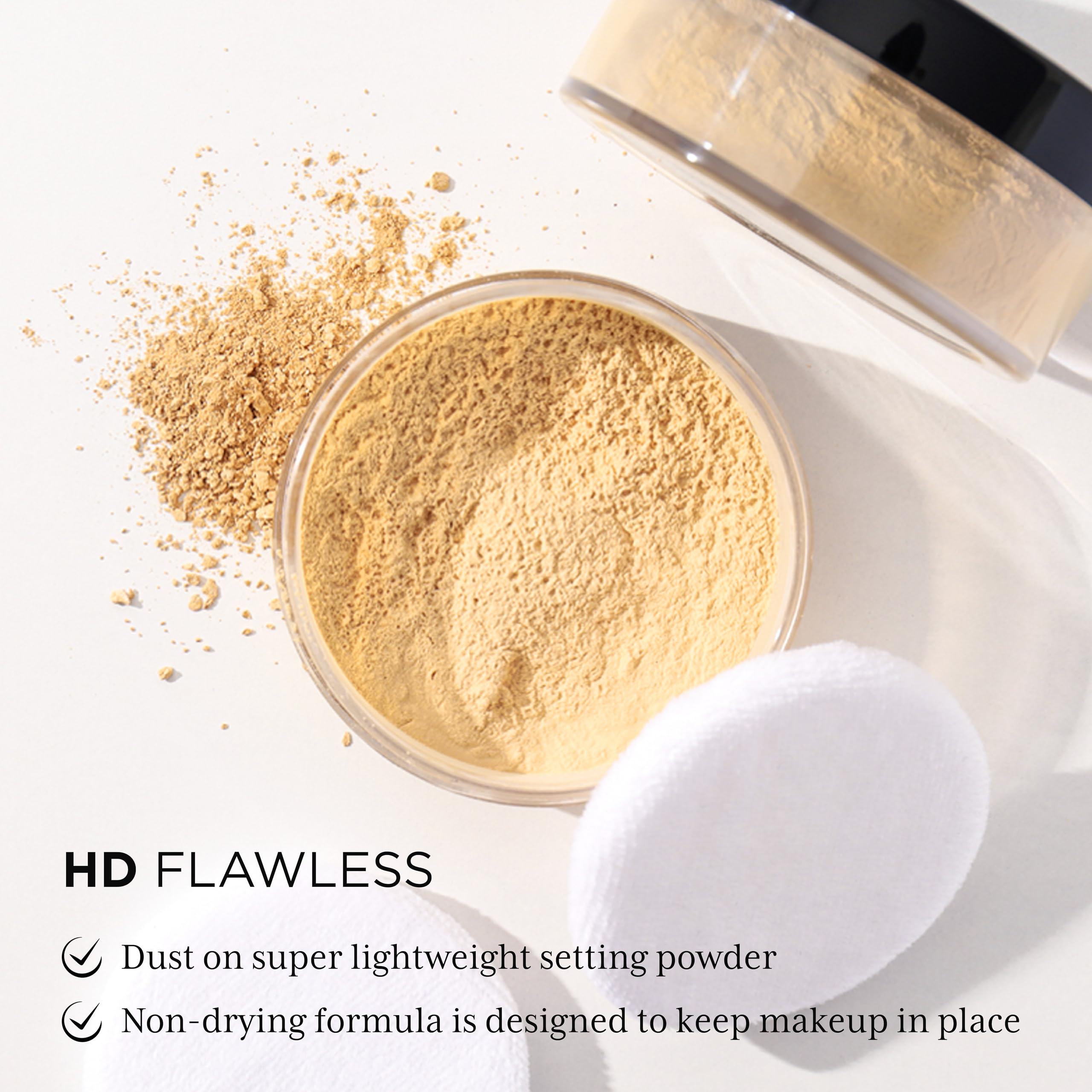 Absolute New York open lid revealing finely milled powder texture, smooth blending benefit