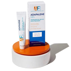 AcneFree 0.5 oz tube beside a coin for size reference and portability