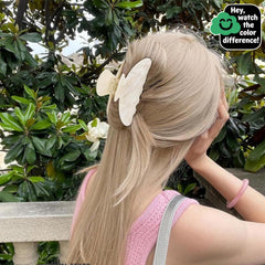 ACO-UINT clip securing a half-up hairstyle demonstrating comfortable all-day wear benefit