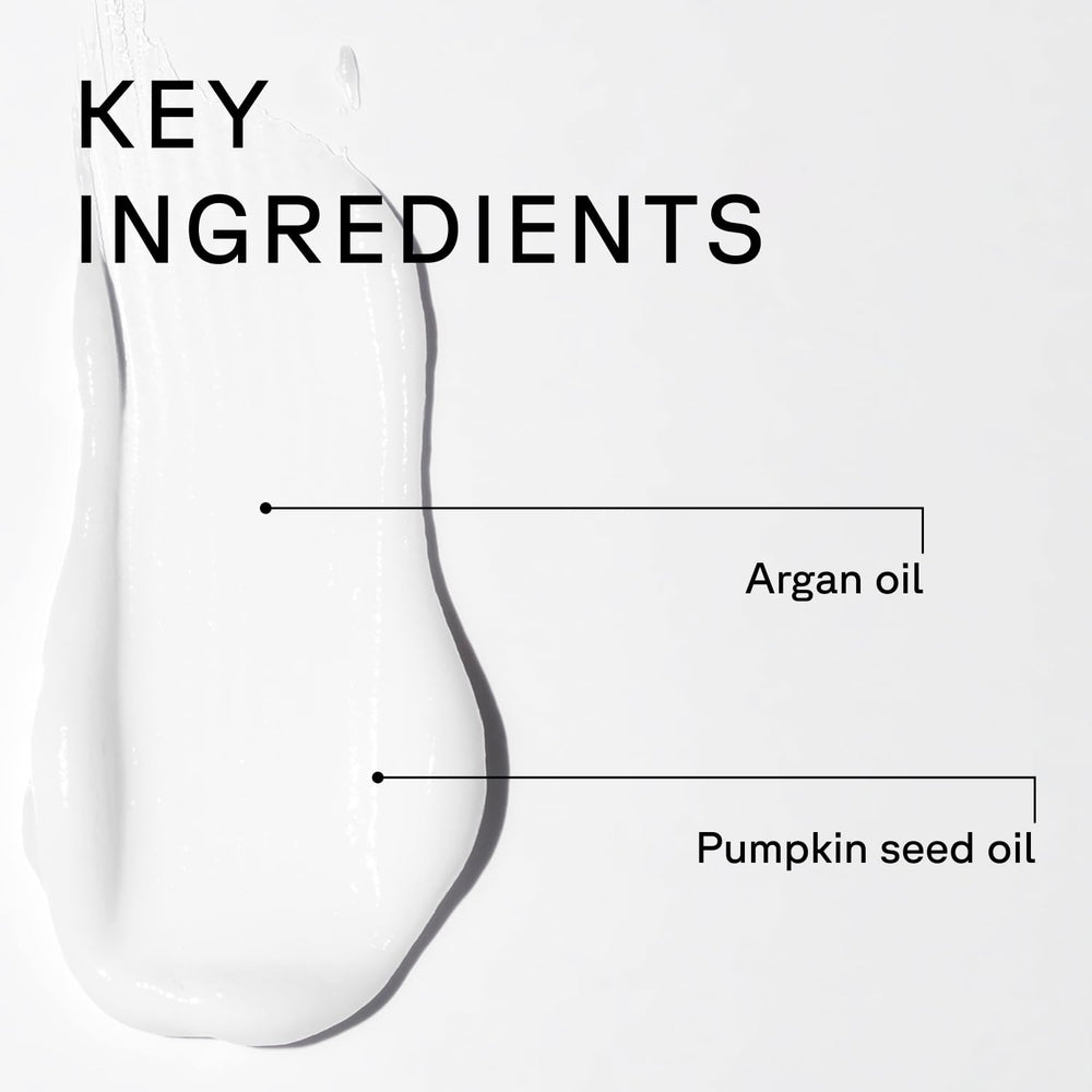 Acure conditioner cream texture scoop showing rich moisturizing benefit