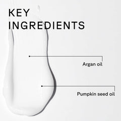 Acure conditioner cream texture scoop showing rich moisturizing benefit