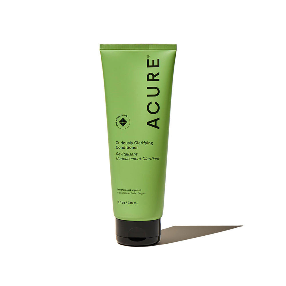 Acure bottle front view showing product and benefit of lightweight clarifying action