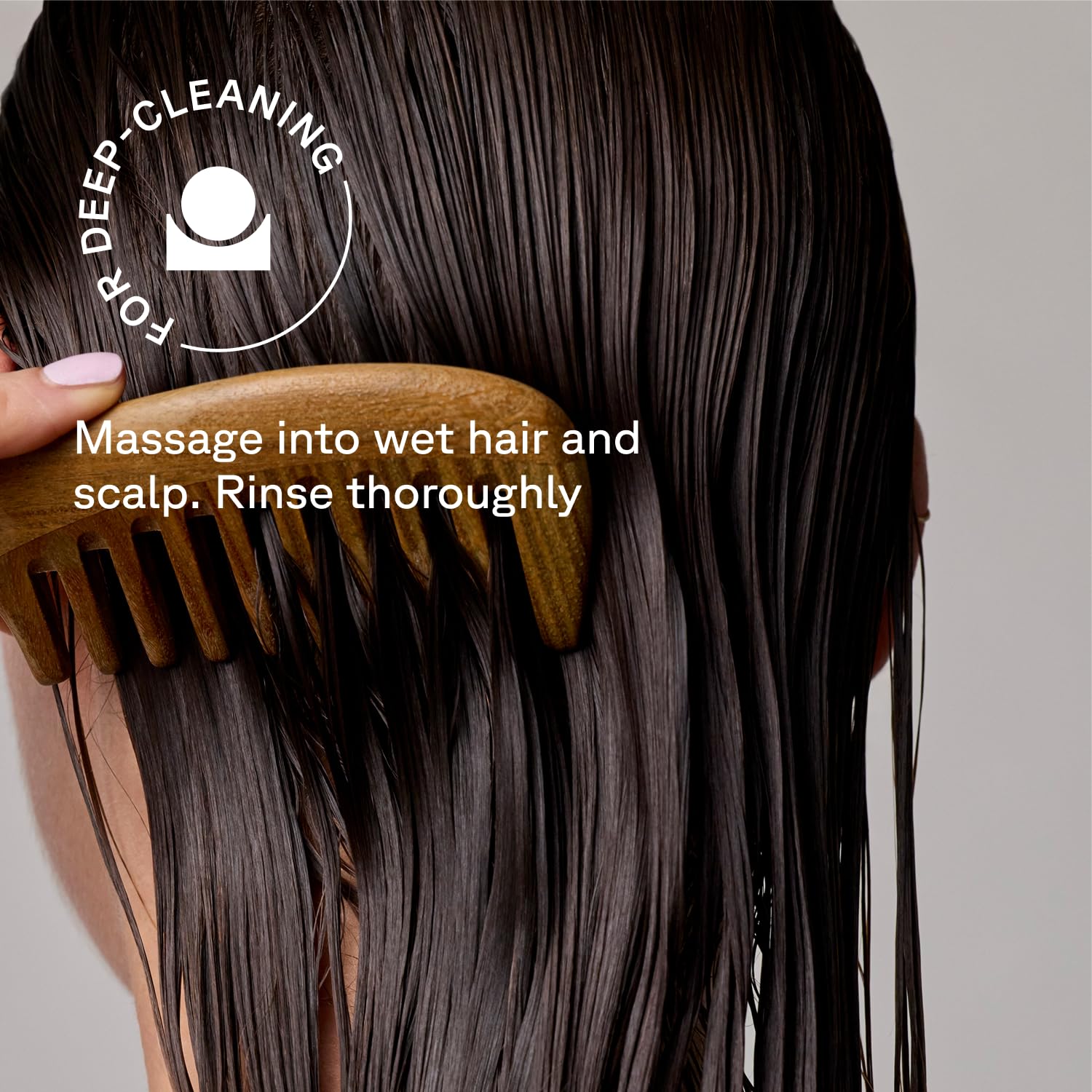 Acure conditioner applied to mid-lengths during shower for freshness